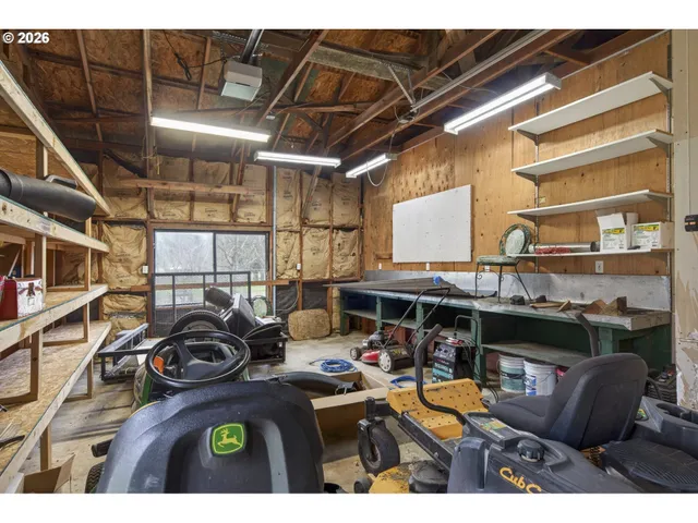 a view of a chairs and table in a patio