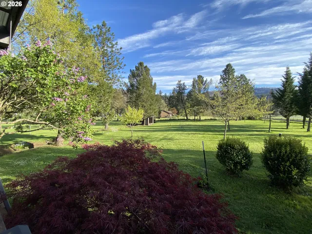 a view of a golf course with a lake