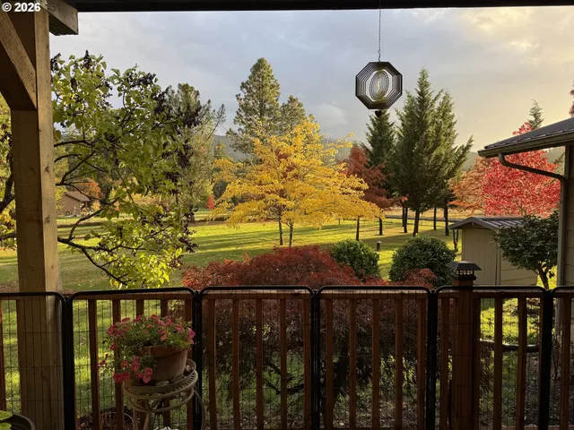 a view of a pathway of a wrought fence