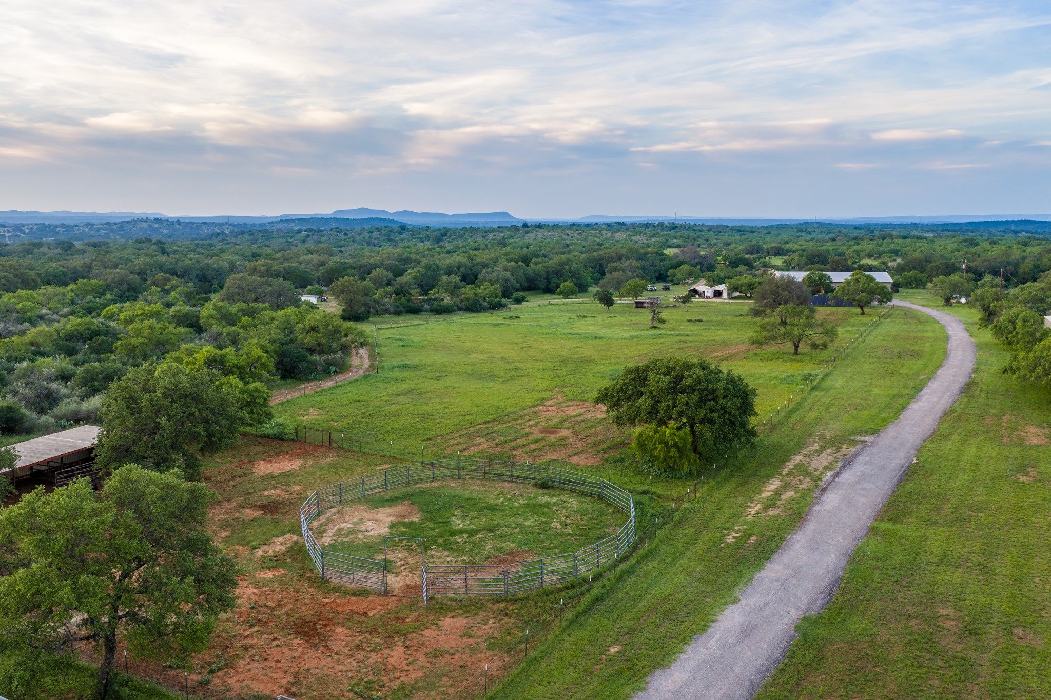 3724 Ranch Road 3347 Round Mountain, TX 78663 - Photo 37 of 40 a view of a grassy field with trees
