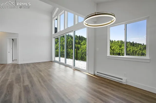 a kitchen with a sink and a large window