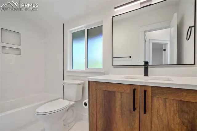 a view of a balcony with wooden floor