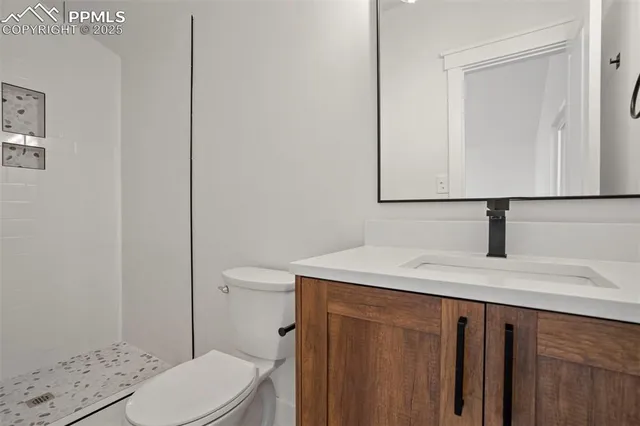 a view of a house with a tree