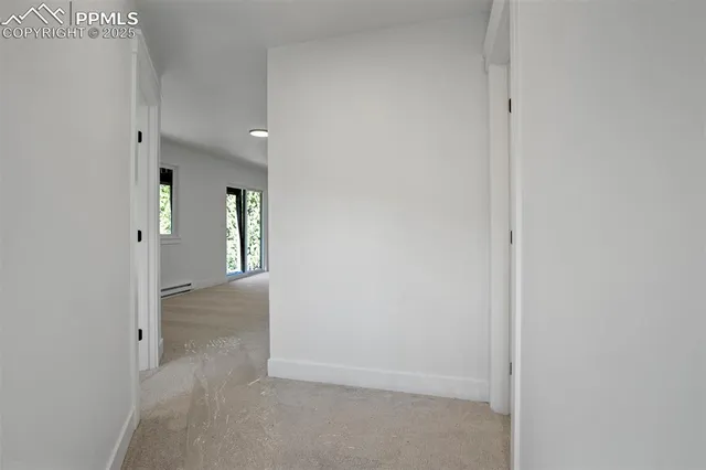 a kitchen with a sink and a stove
