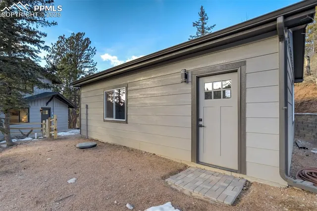 a view of outdoor space and front view of a house