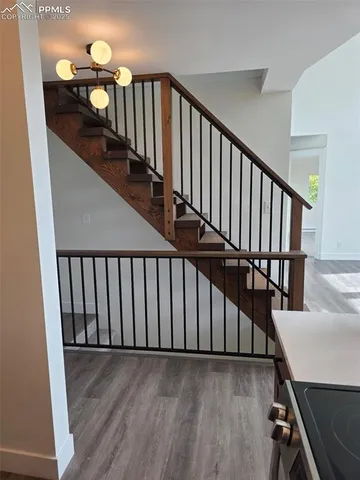 a view of entryway with wooden floor