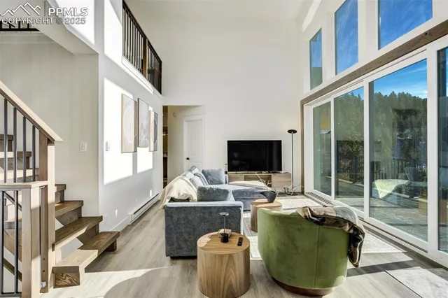 a living room with couch and a flat screen tv