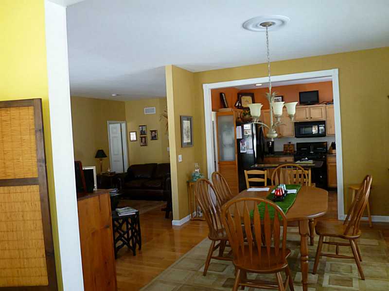 14 Intervale Road, Unit 14 Smithfield, RI 02917 - Photo 25 of 25 Dining Room. Open floor plan with views from kitchen to dining room to florida.