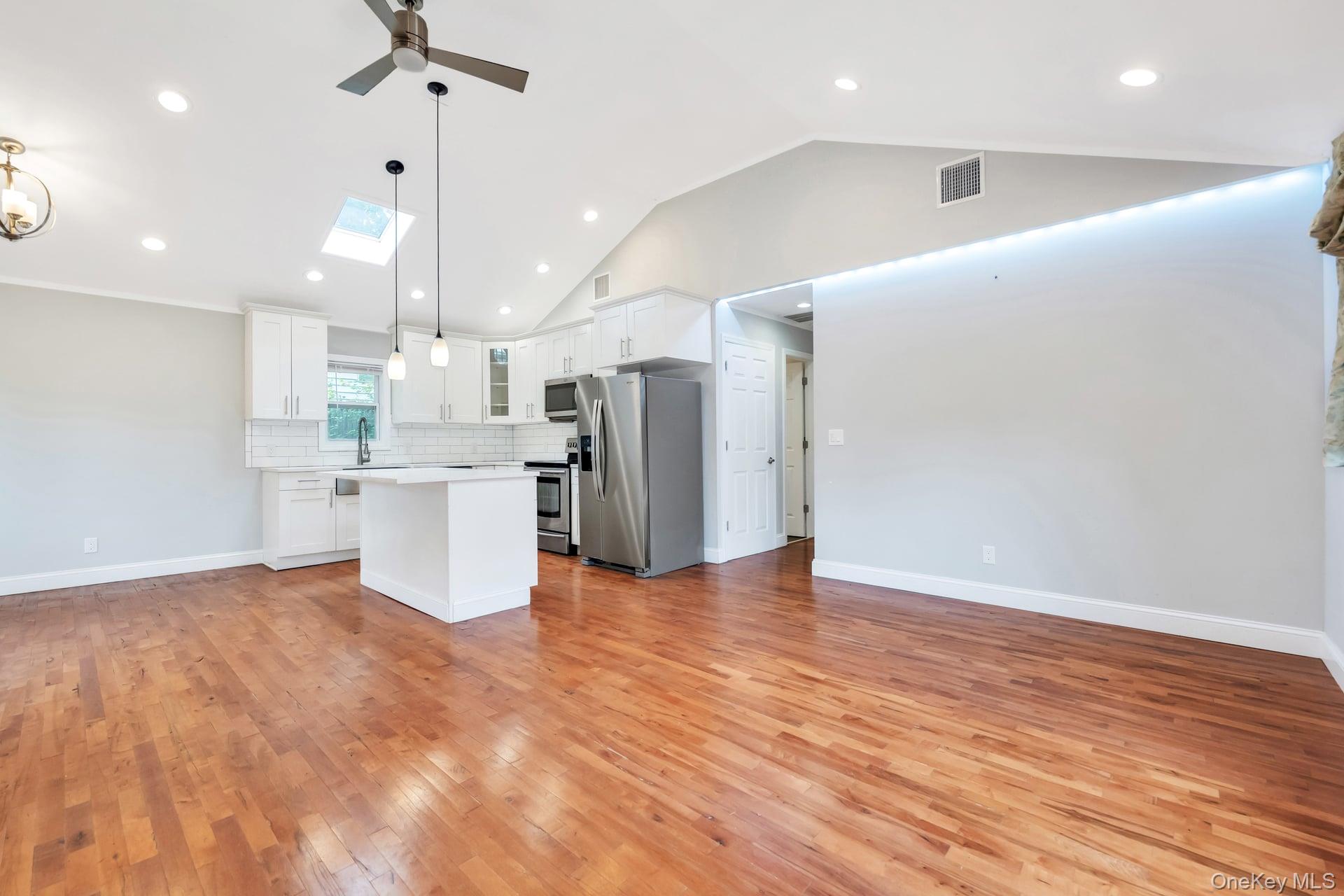 30 Harding Road Ronkonkoma, NY 11779 - Photo 17 of 38 a view of kitchen with stainless steel appliances refrigerator stove top oven and cabinets