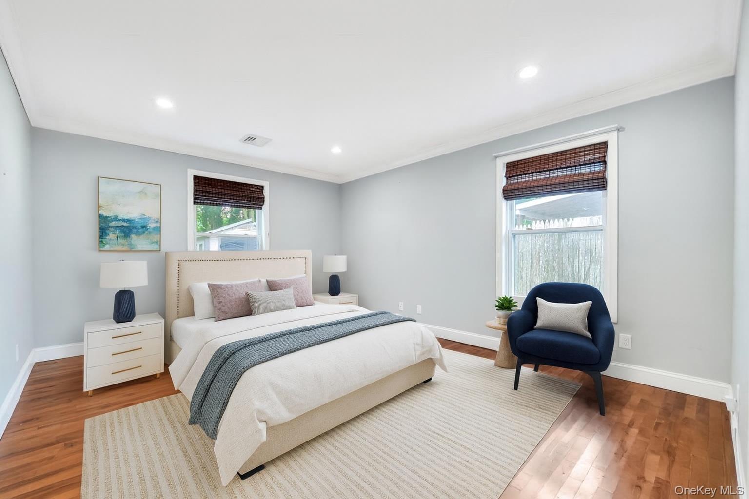 30 Harding Road Ronkonkoma, NY 11779 - Photo 24 of 38 a bedroom with a bed and a window