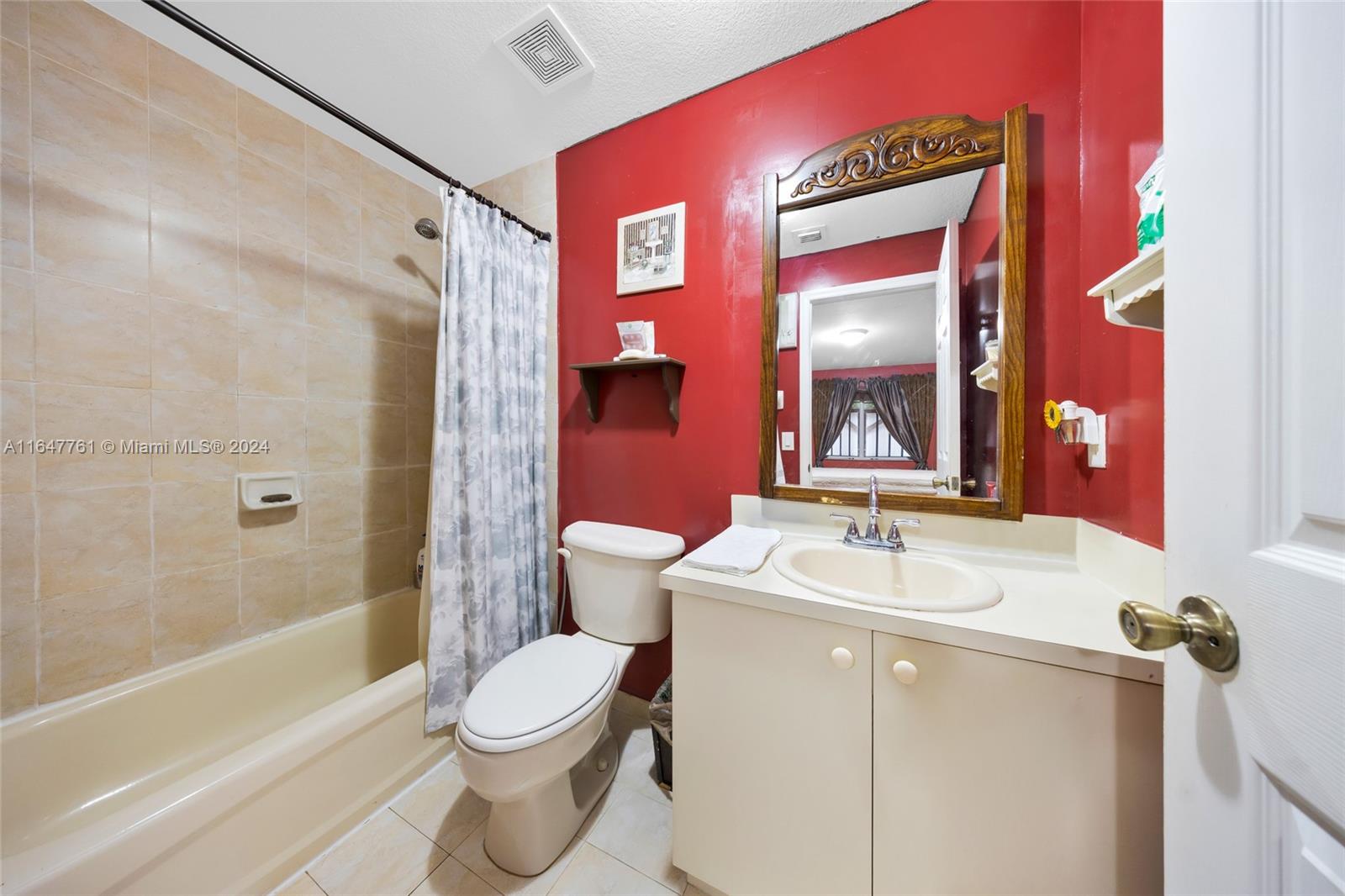 12431 Southwest 220th Street Miami, FL 33170 - Photo 19 of 34 a bathroom with a sink toilet and shower