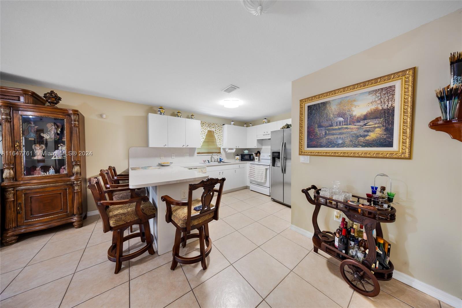 12431 Southwest 220th Street Miami, FL 33170 - Photo 21 of 34 a view of a dining room with furniture