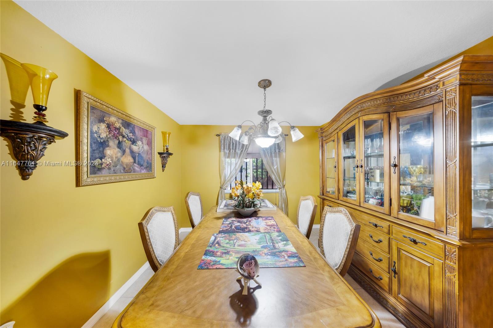 12431 Southwest 220th Street Miami, FL 33170 - Photo 7 of 34 a view of a living room and dining room