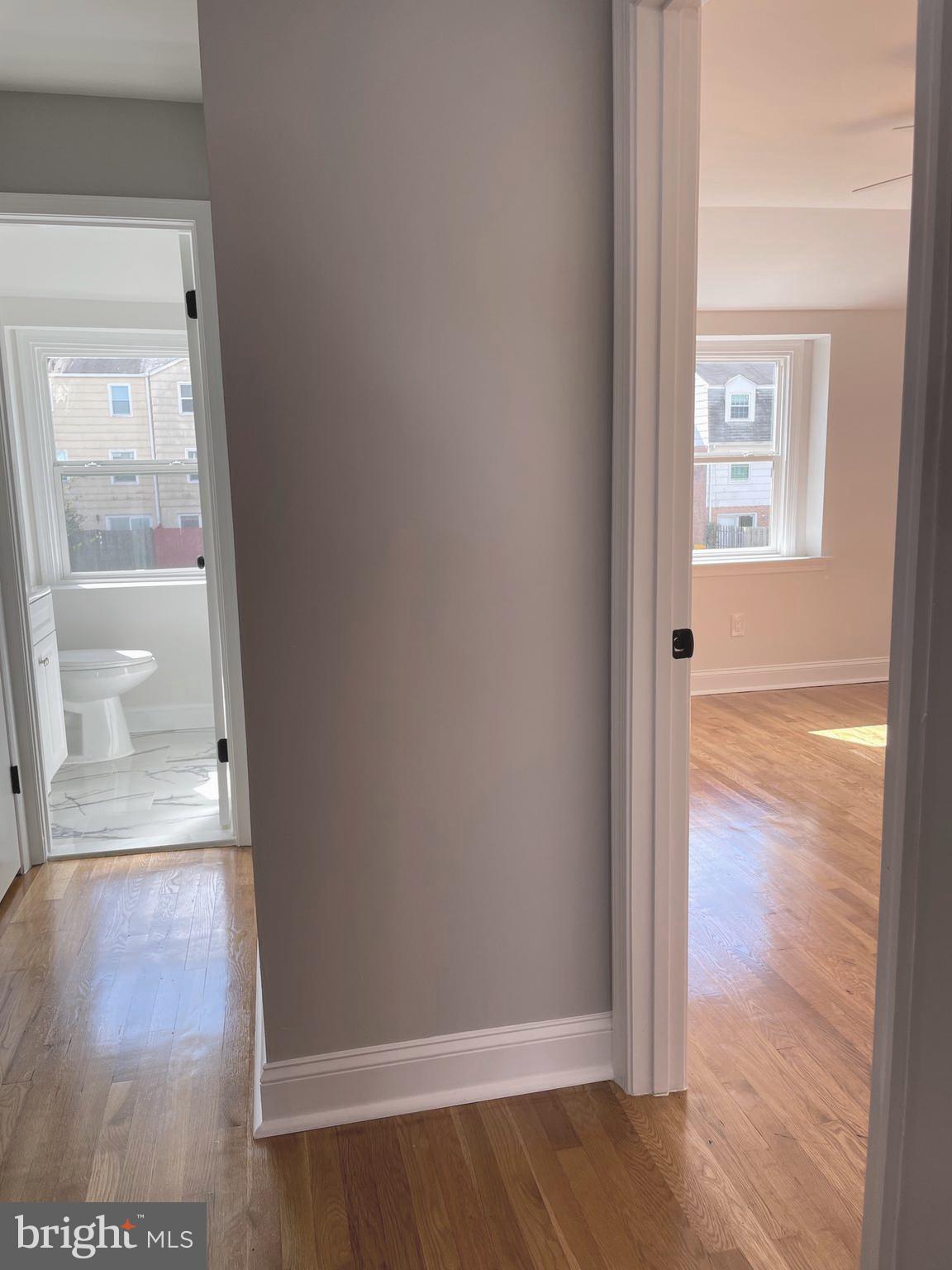 136 Old Enterprise Road, Unit 131 Upper Marlboro, MD 20774 - Photo 14 of 36 a view of a hallway with wooden floor
