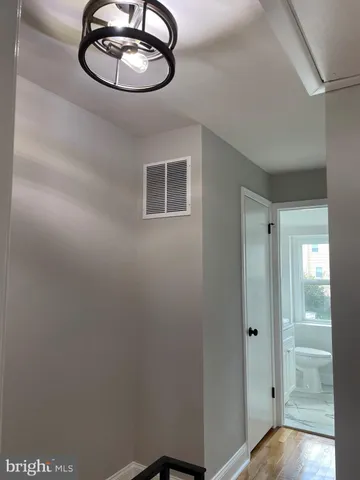 a view of a livingroom with a washer and dryer