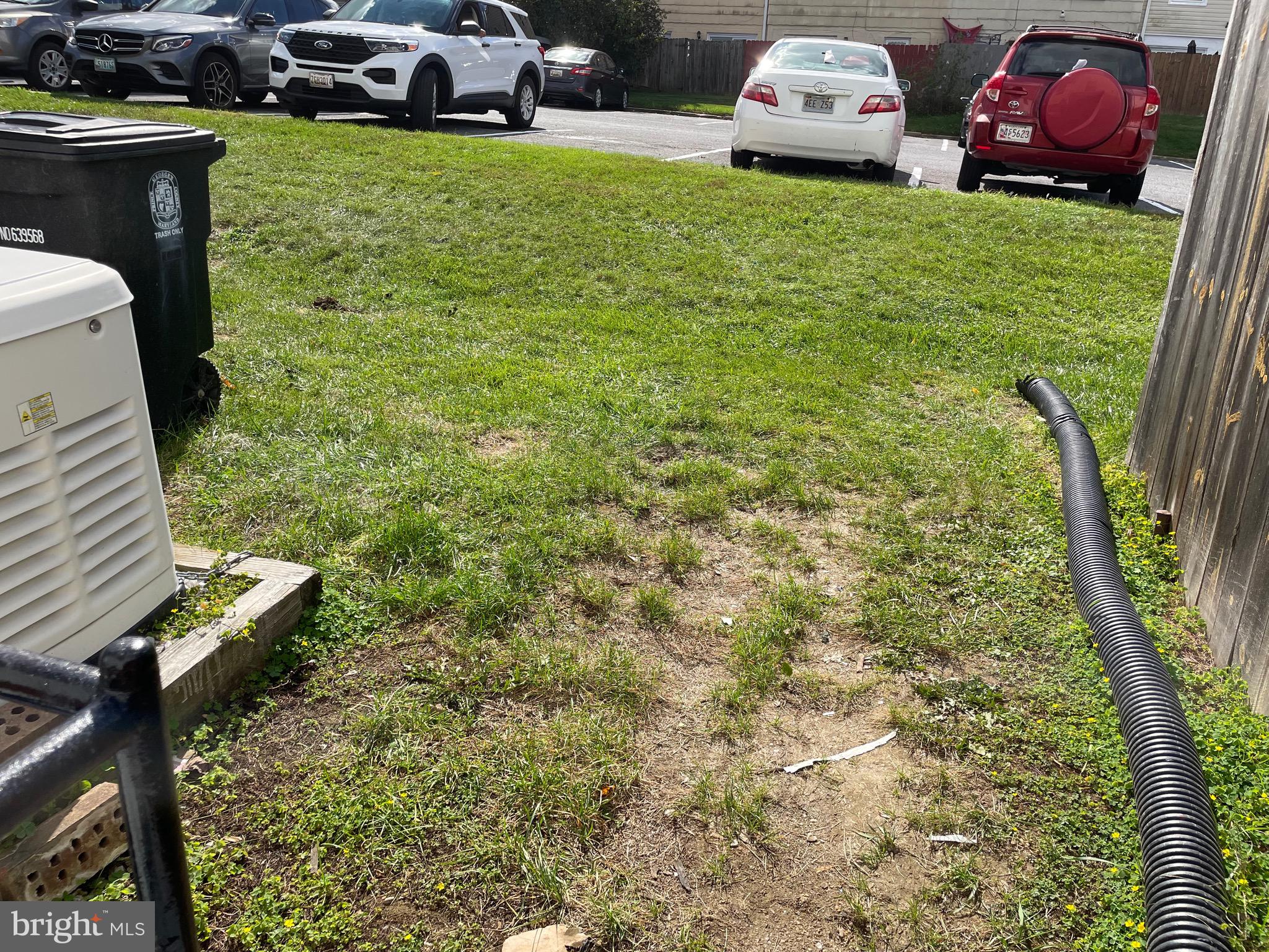 136 Old Enterprise Road, Unit 131 Upper Marlboro, MD 20774 - Photo 31 of 36 a view of a backyard with table and chairs