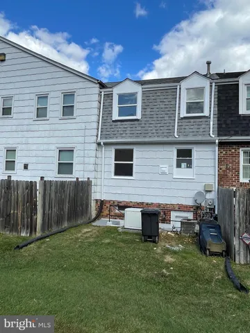 a front view of house with yard