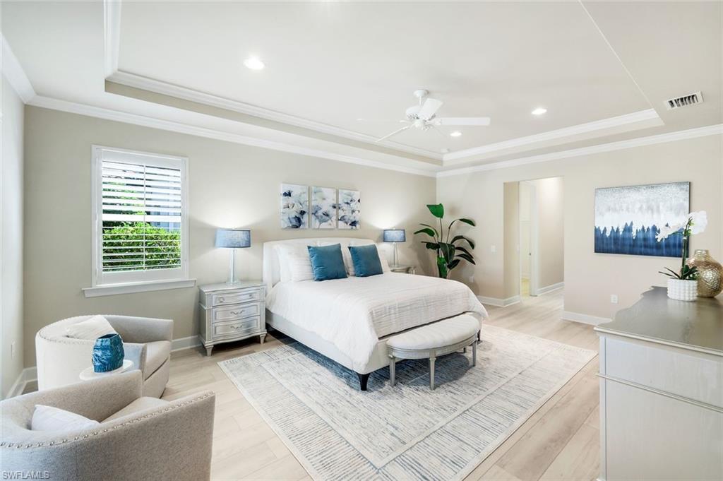9314 Quarry Drive Naples, FL 34120 - Photo 18 of 49 a living room with furniture and windows