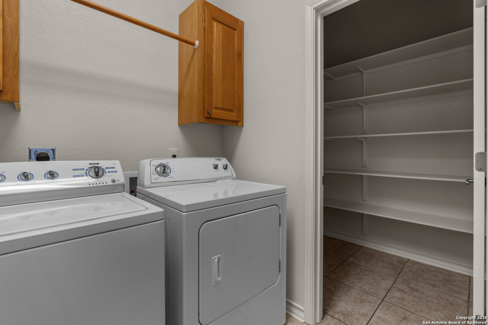 174 Edgewood Circle Bandera, TX 78003 - Photo 15 of 33 a utility room with dryer and washer