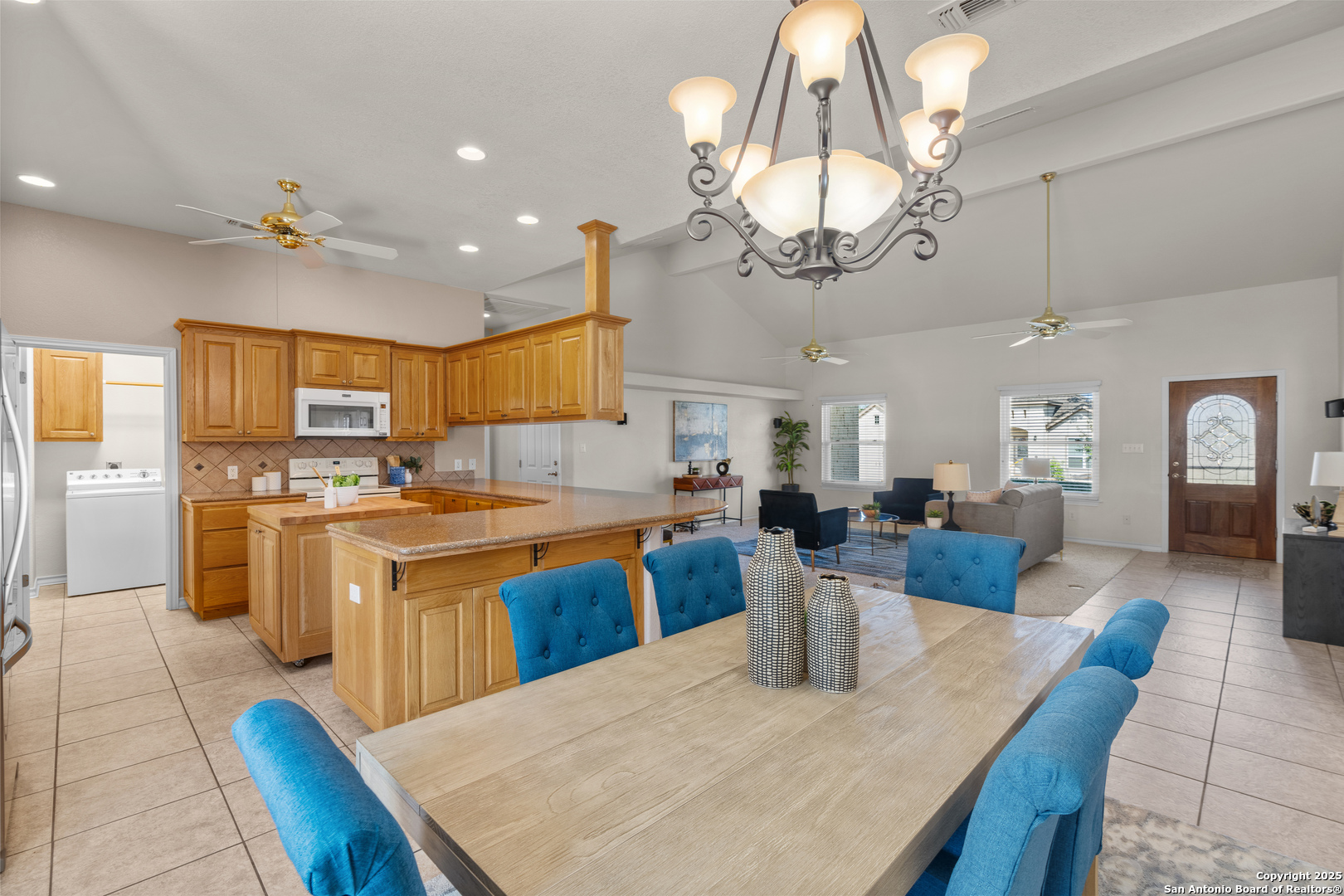 174 Edgewood Circle Bandera, TX 78003 - Photo 17 of 33 a large kitchen with a table and chairs