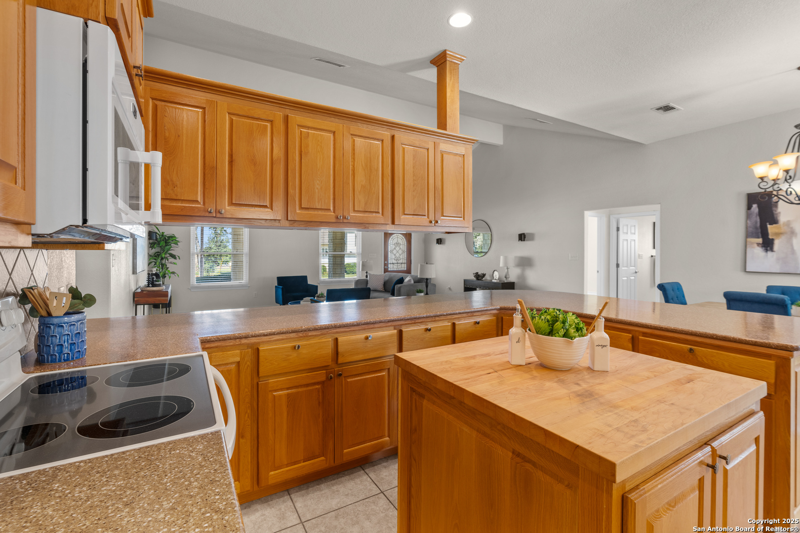 174 Edgewood Circle Bandera, TX 78003 - Photo 8 of 33 a kitchen with a sink cabinets and a window