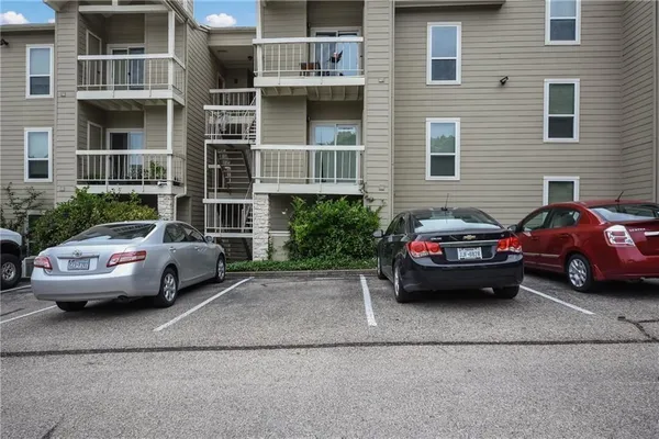 a car parked in front of a house
