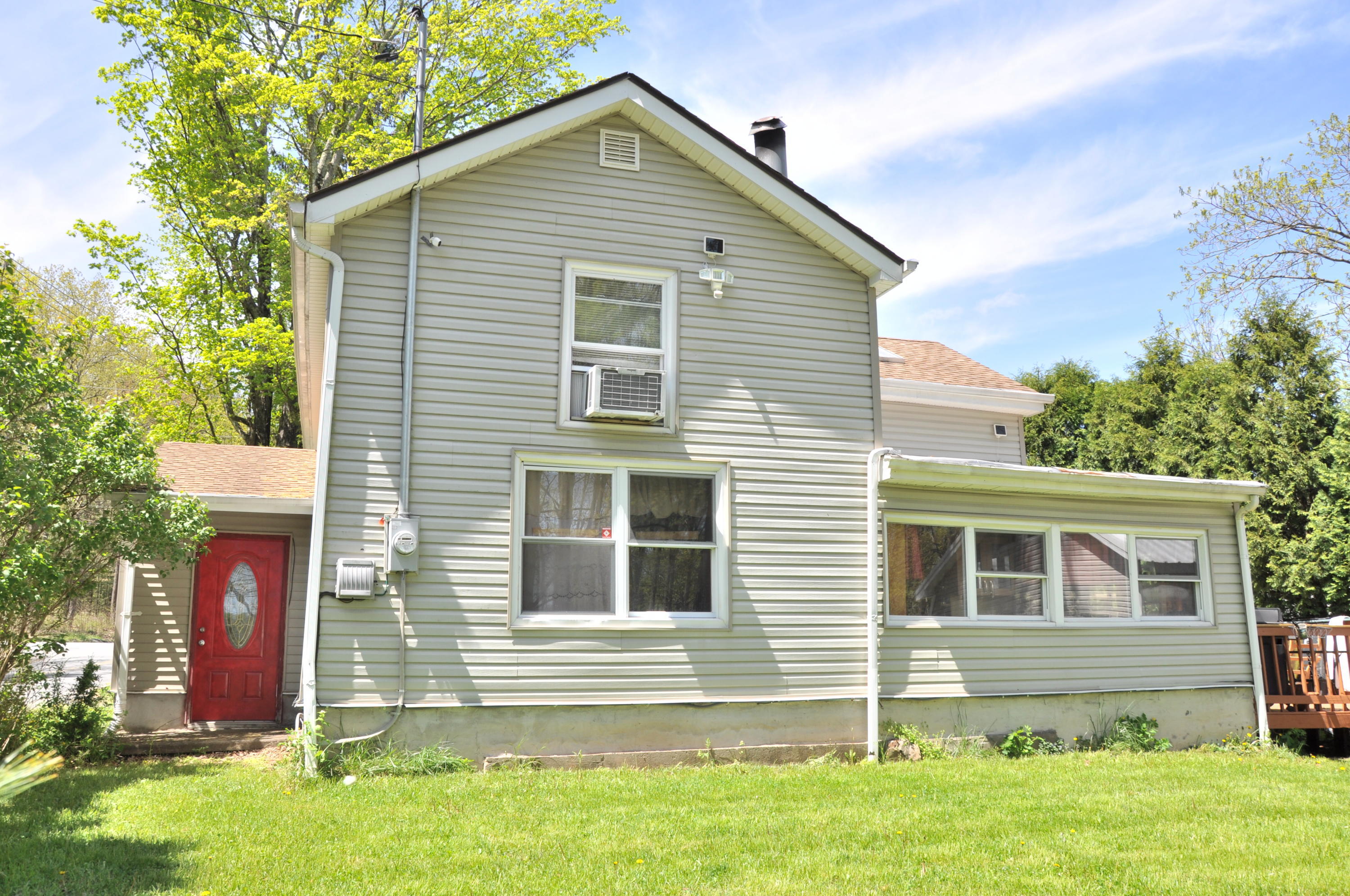 1407 Astolat Road Effort, PA 18330 - Photo 1 of 16 a front view of house with yard
