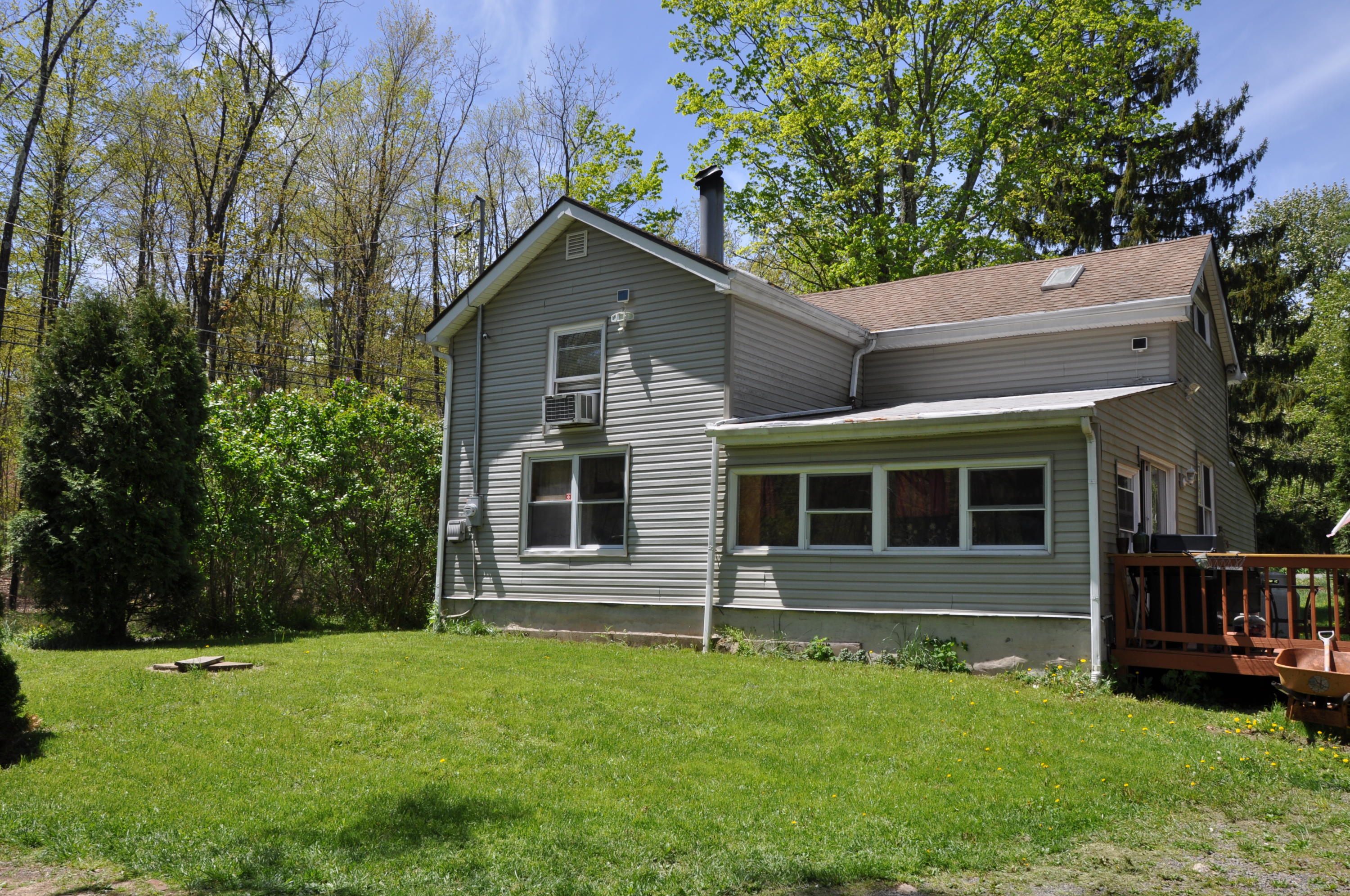 1407 Astolat Road Effort, PA 18330 - Photo 16 of 16 a front view of a house with a yard