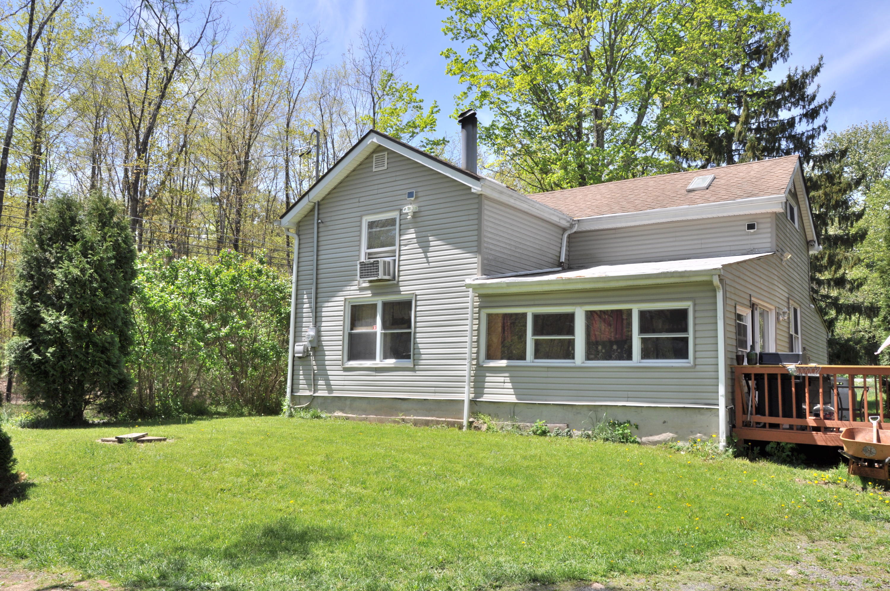 1407 Astolat Road Effort, PA 18330 - Photo 4 of 16 a front view of a house with a yard