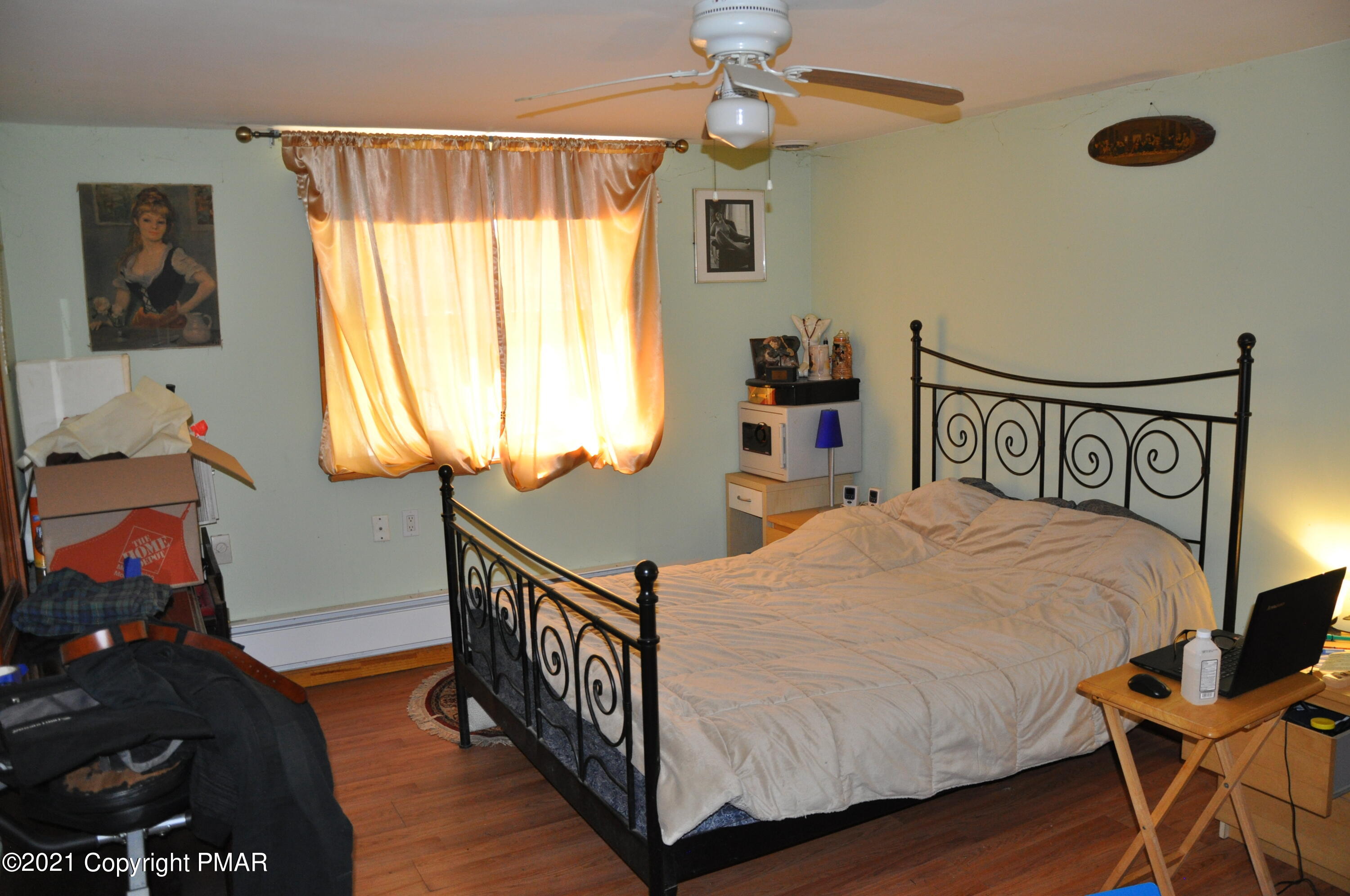 1407 Astolat Road Effort, PA 18330 - Photo 7 of 16 a bed room with a bed and a window
