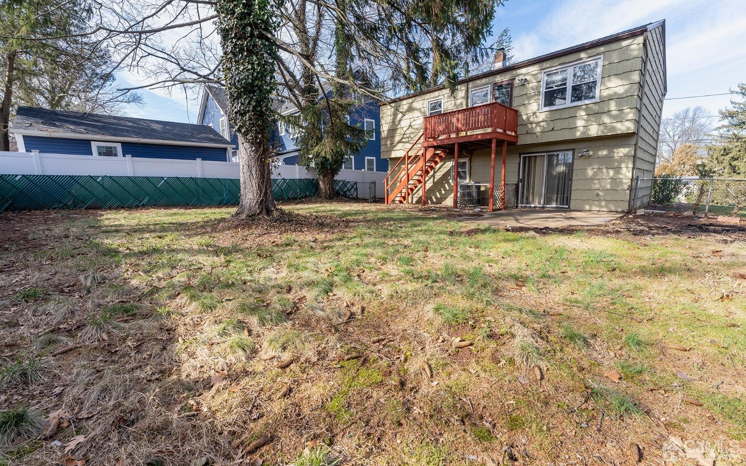 103 Alfred Street Edison, NJ 08820 - Photo 19 of 21 a view of a house with a yard and a tree