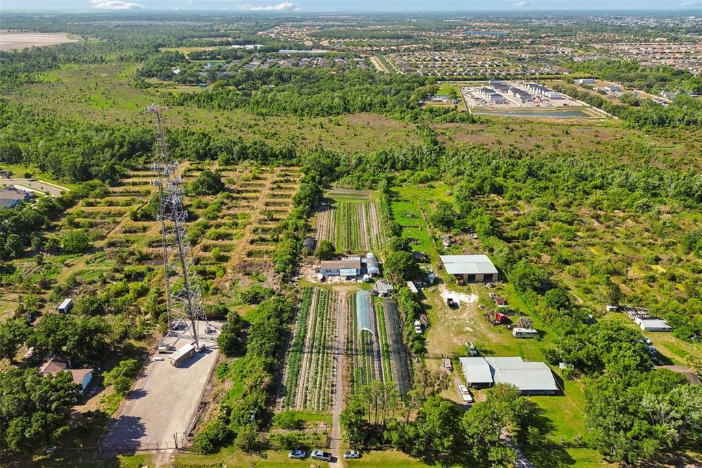 11101 Sumner Road Wimauma, FL 33598 - Photo 35 of 35 an aerial view of residential houses with outdoor space