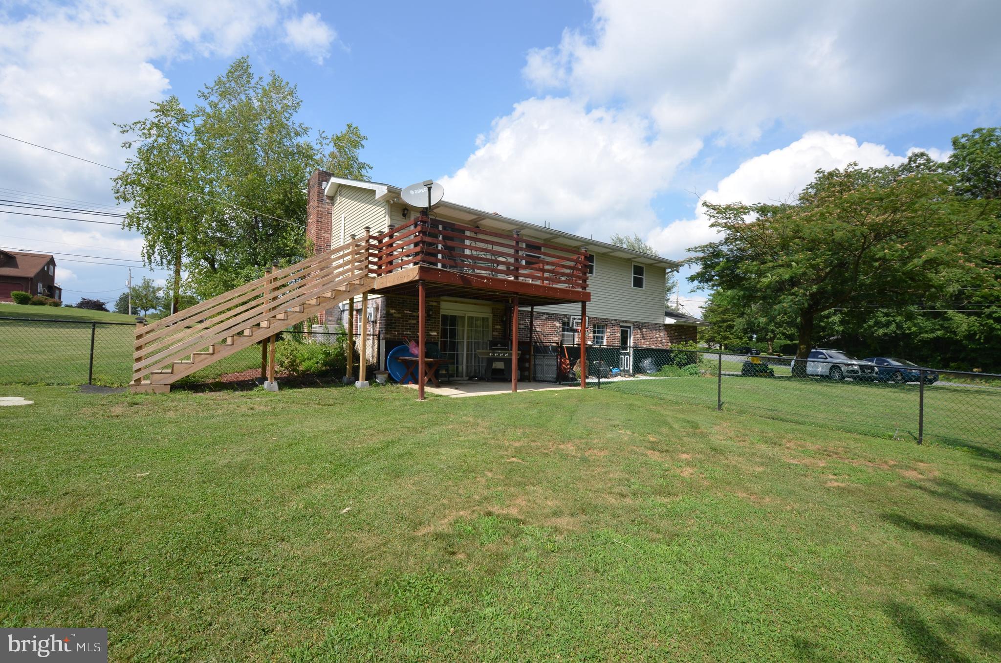 653 Trach Road Bath, PA 18014 - Photo 22 of 23 a view of a house with a backyard