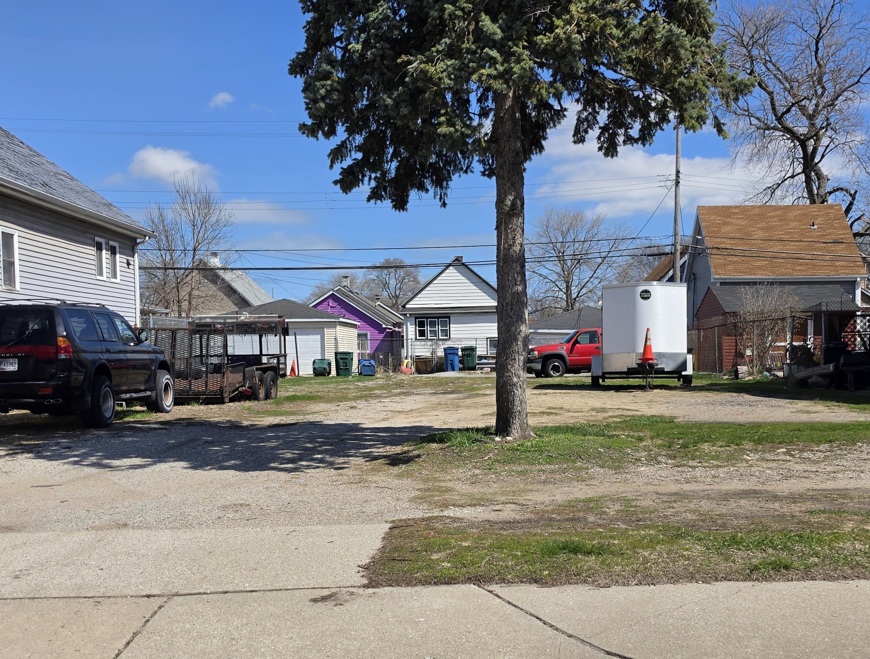931 Summer Street Hammond, IN 46320 - Photo 1 of 2 a view of a big house with a yard and tree s