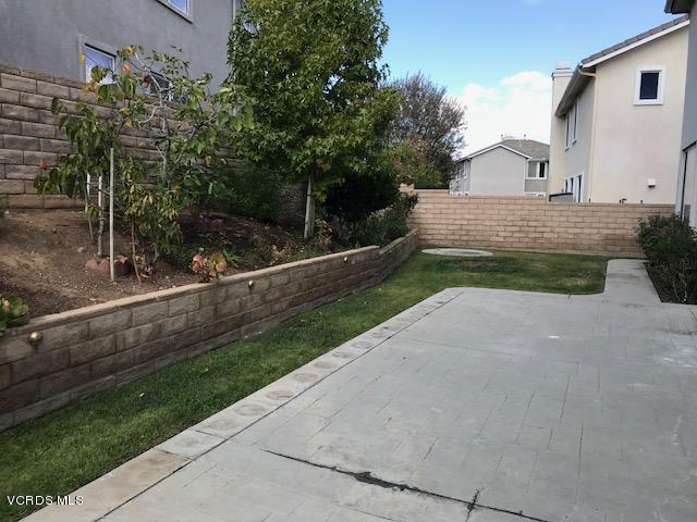 1511 Hidden Ranch Drive Simi Valley, CA 93063 - Photo 21 of 27 a view of house with backyard and garden