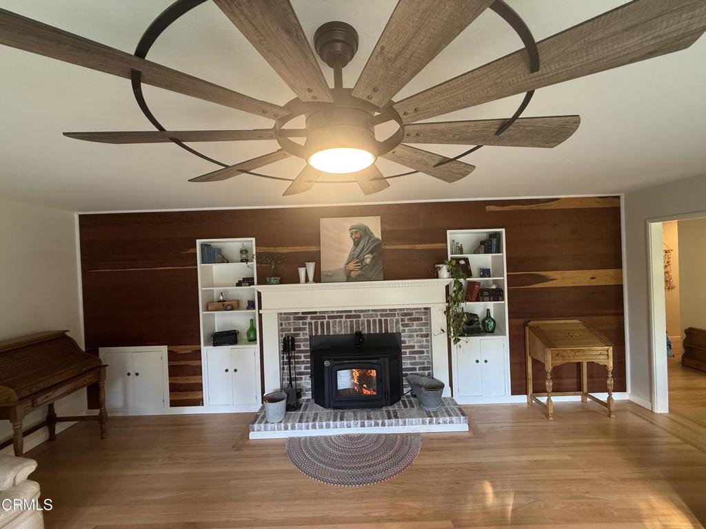 31400 Sherwood Road Fort Bragg, CA 95437 - Photo 5 of 55 a living room with furniture and a fireplace