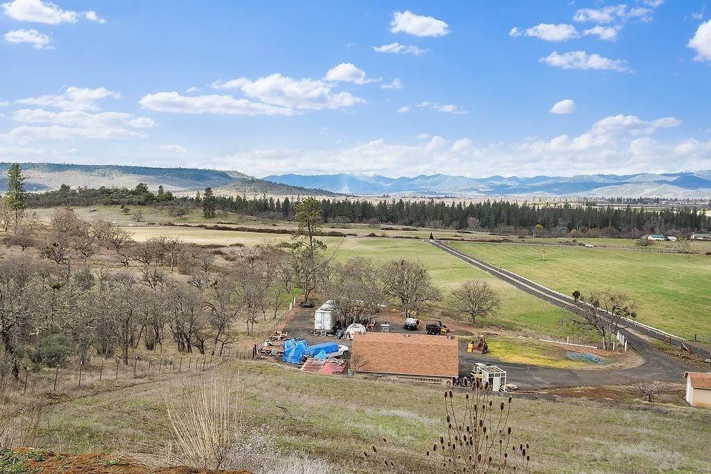12850 Agate Road Eagle Point, OR 97524 - Photo 12 of 35 a view of a lake with a terrace
