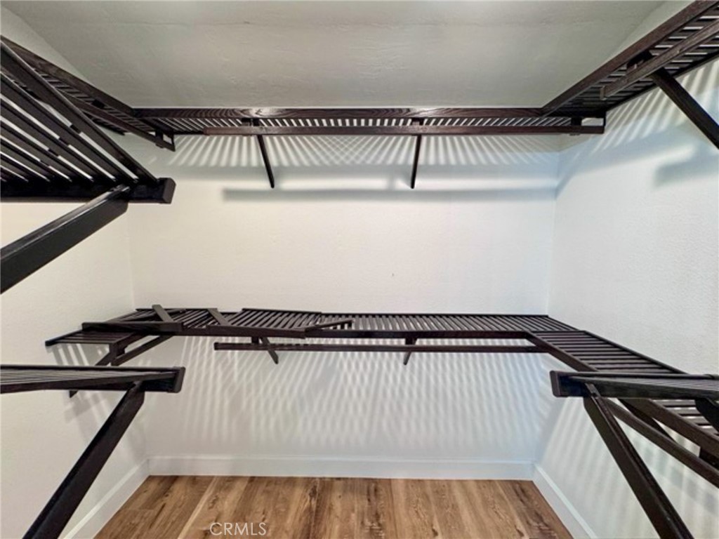 38901 Pso Corta Murrieta, CA 92563 - Photo 39 of 51 a view of a room with wooden floor