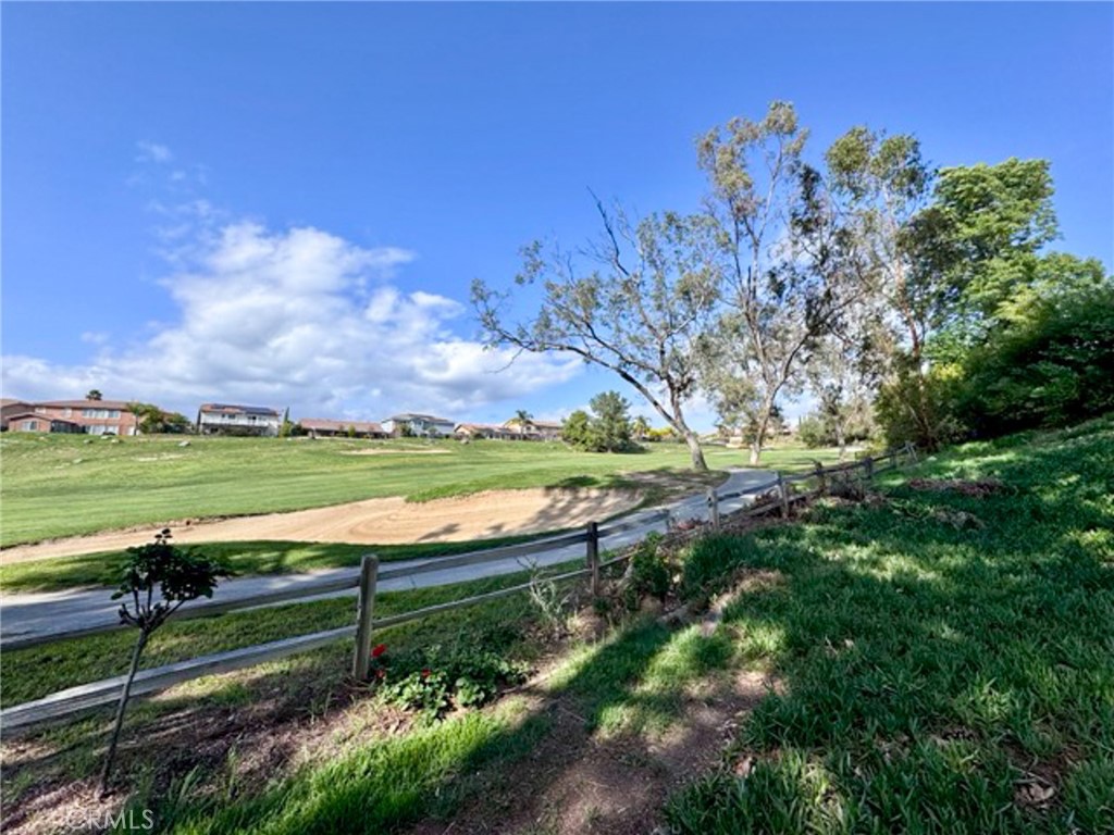 38901 Pso Corta Murrieta, CA 92563 - Photo 46 of 51 a view of a garden with an trees