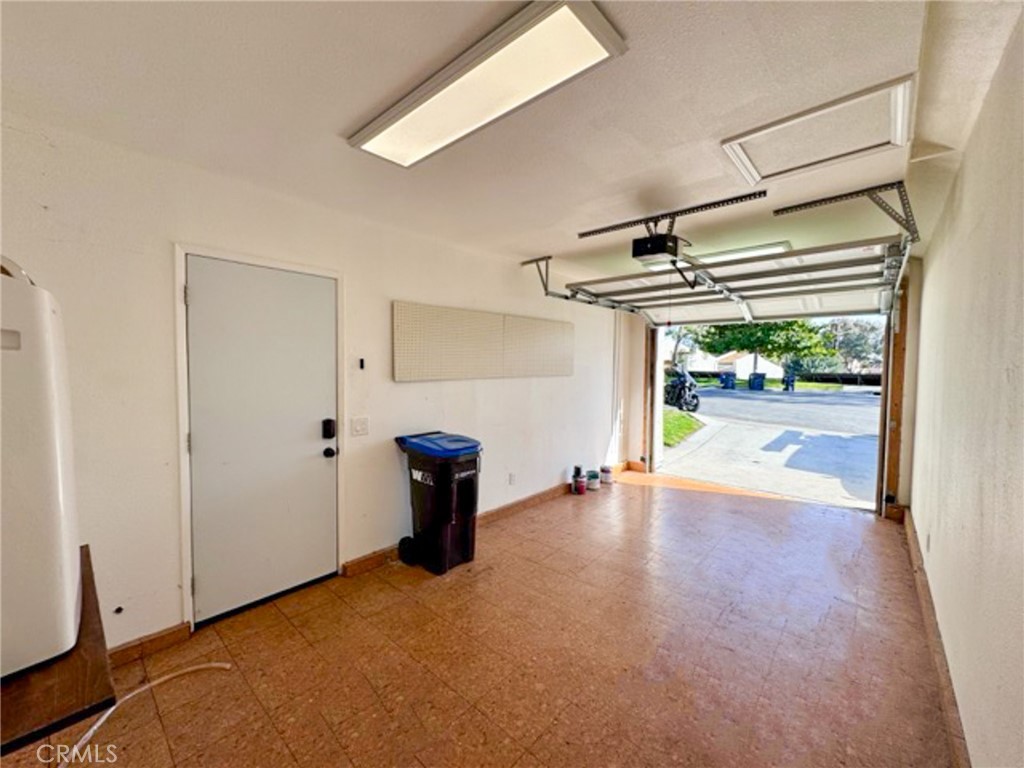 38901 Pso Corta Murrieta, CA 92563 - Photo 50 of 51 a view of empty room with wooden floor and windows