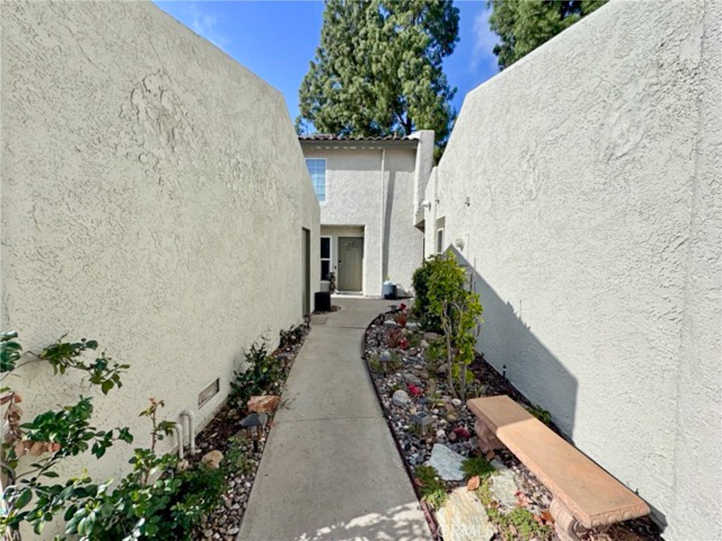 38901 Pso Corta Murrieta, CA 92563 - Photo 6 of 51 a front view of a house with a yard