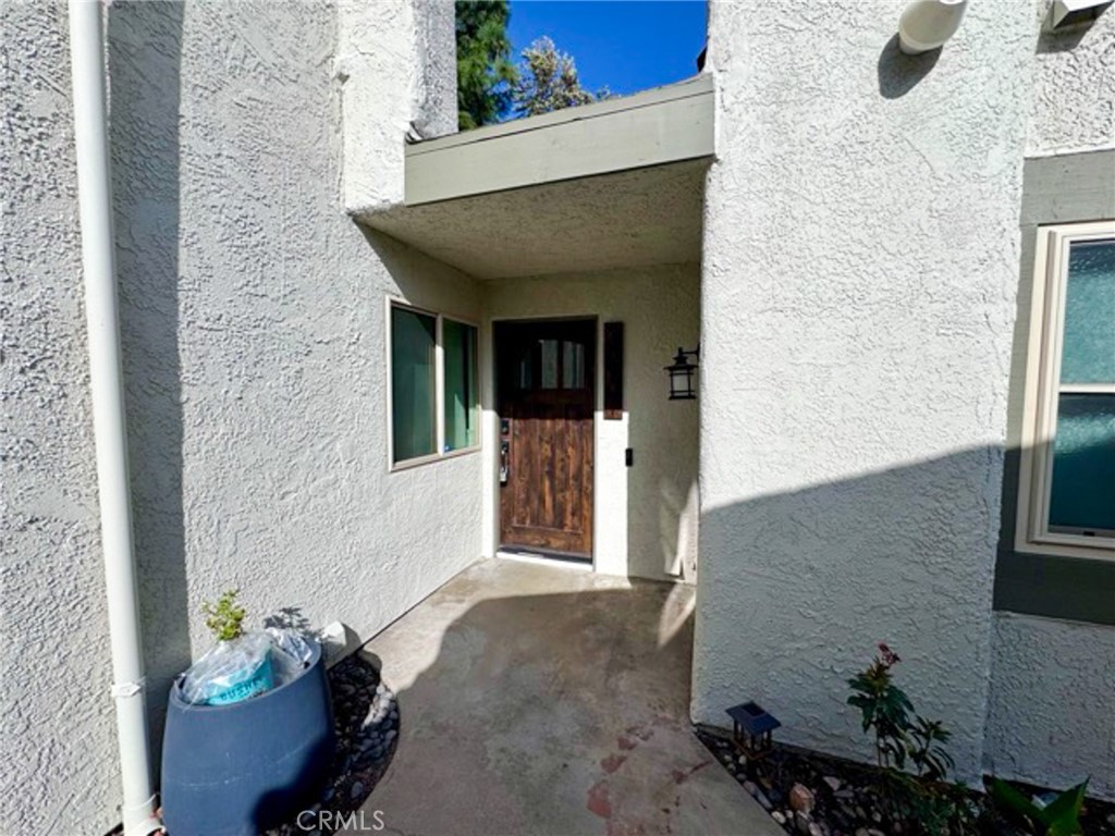 38901 Pso Corta Murrieta, CA 92563 - Photo 7 of 51 a front view of a house with outdoor seating