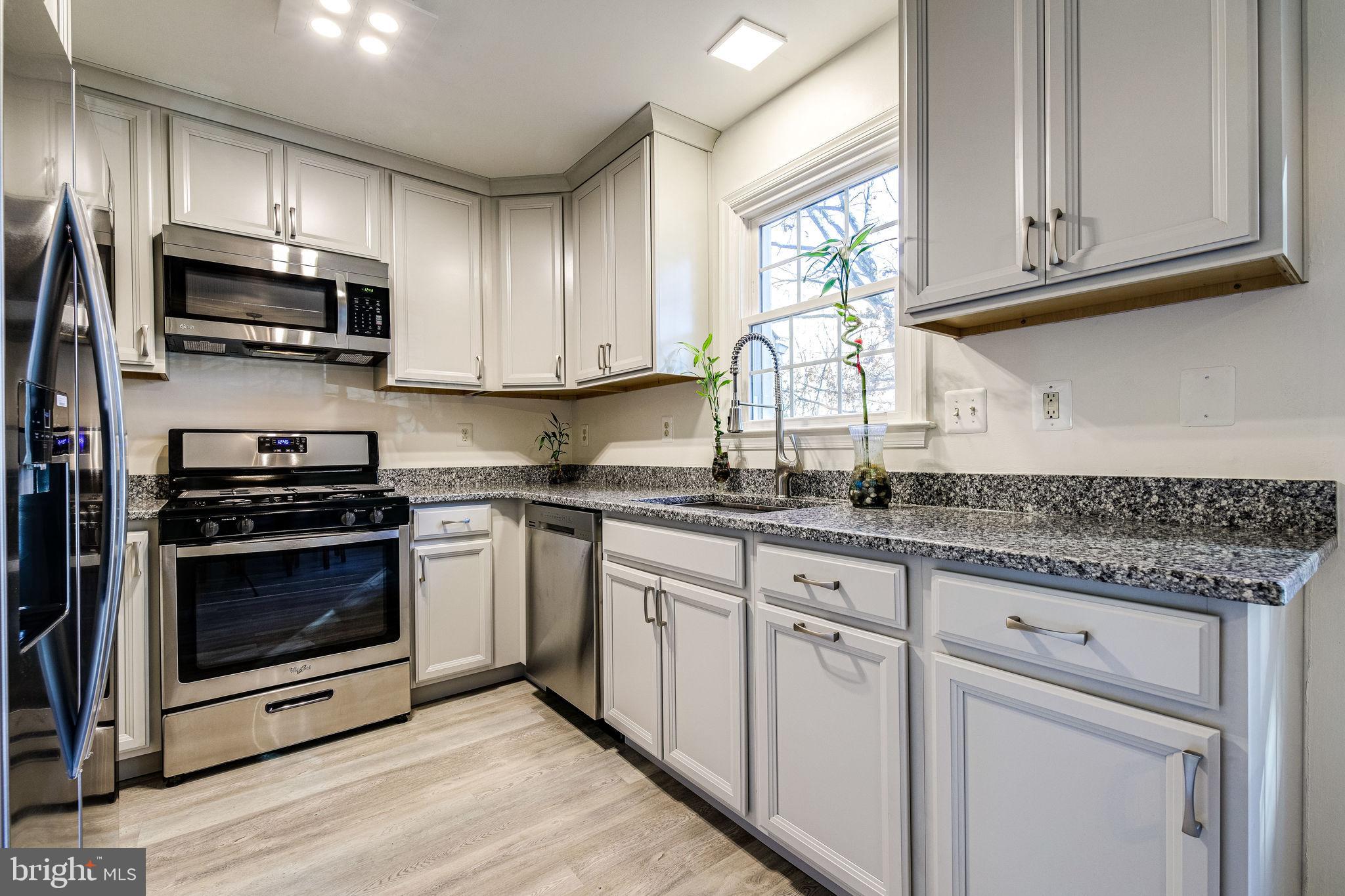 105 Rees Place Falls Church, VA 22046 - Photo 15 of 60 Bright Kitchen with New Light Fixtures