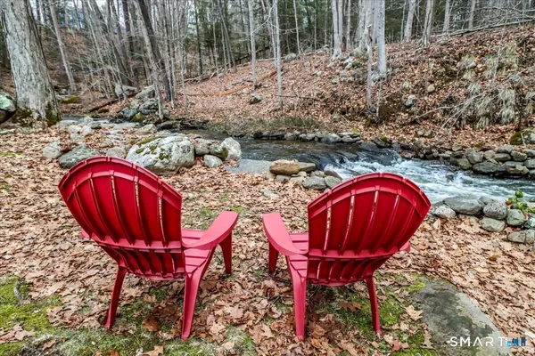 a view of yard with outdoor seating