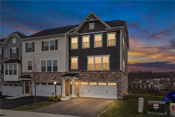 a bathroom with a shower and a sink