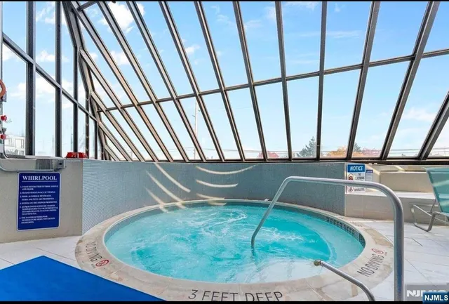 a room with lots of furniture and clutter