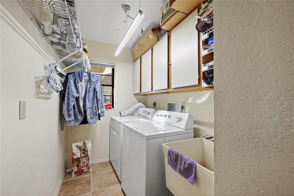 25192 Derringer Road Punta Gorda, FL 33983 - Photo 33 of 39 a utility room with dryer and washer