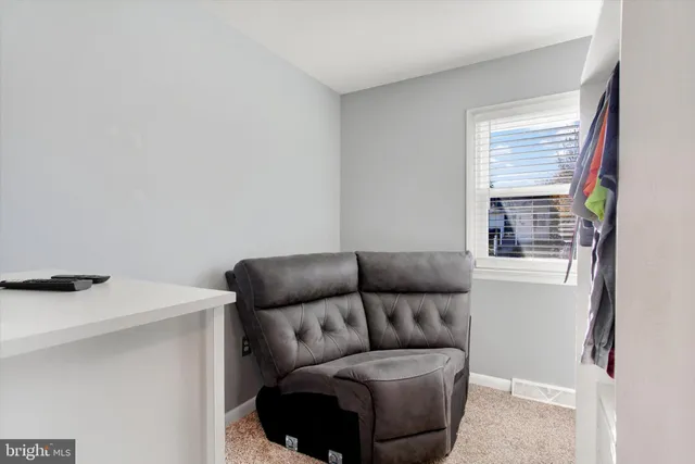 a bathroom with a sink a tub and a mirror