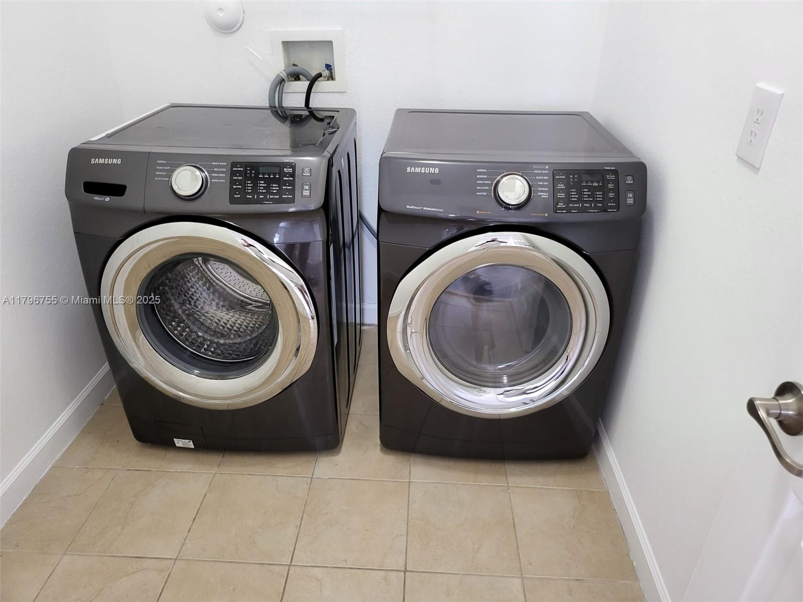 11729 Southwest 236th Street Homestead, FL 33032 - Photo 22 of 22 a view of washer and dryer in a utility room