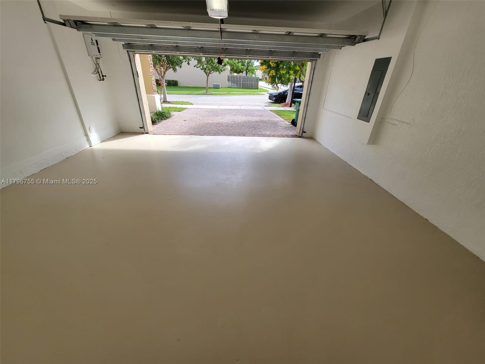 11729 Southwest 236th Street Homestead, FL 33032 - Photo 10 of 22 a view of a garage